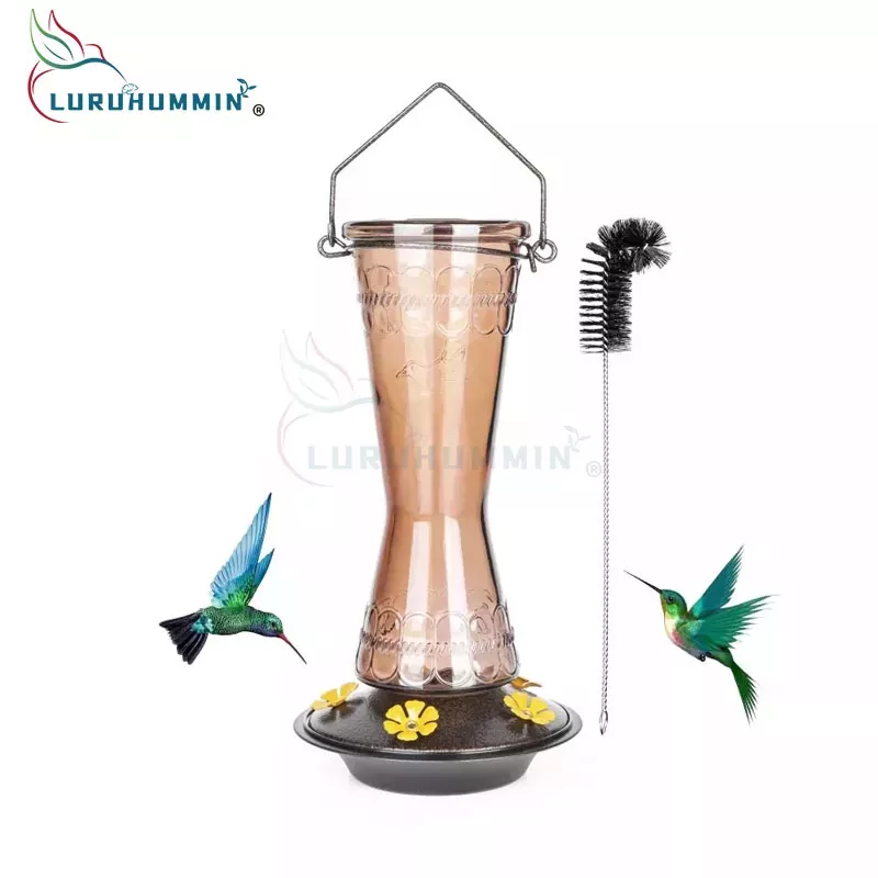 Cad iad na gnéithe ba chóir a bheith ag friothálacha maith Hummingbird chun éanlaithe a mhealladh go héifeachtach?